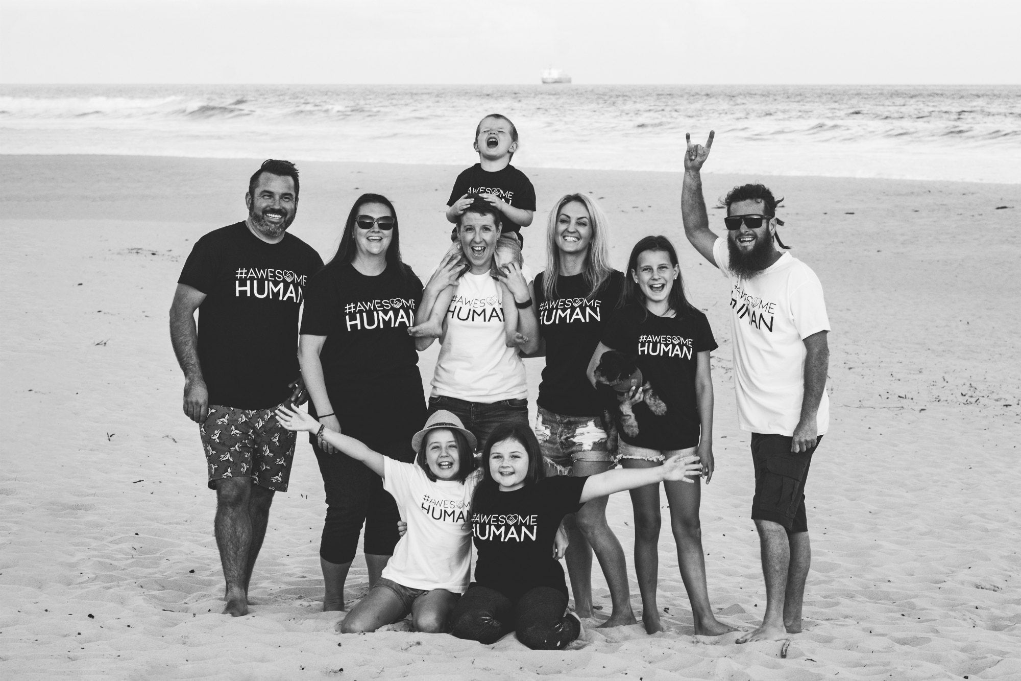 Awesome Human Community beach black and white